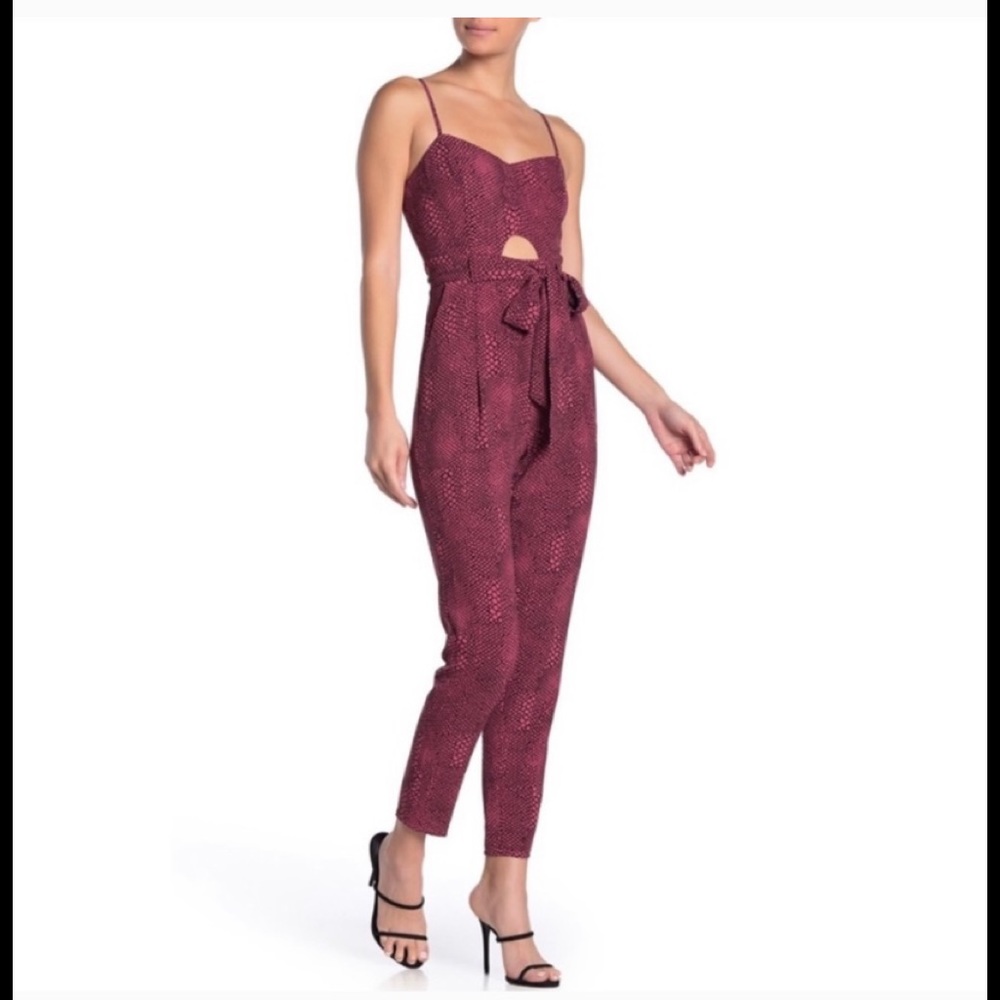 Material girl cut out pink and black jumpsuit